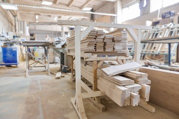 Background carpentry woodworking woodshop, machines and tools, wooden boards