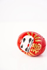 Daruma Doll isolated against white