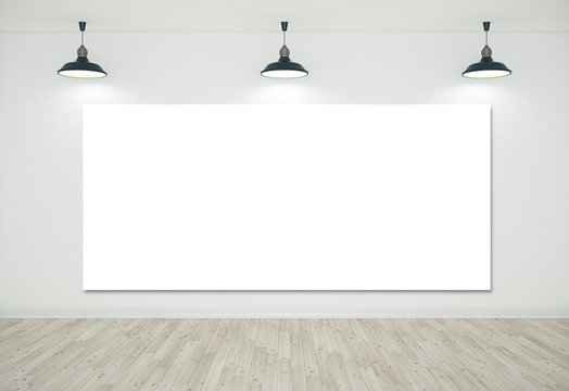 White room with blank poster on wall
