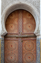 Fototapeta na wymiar Old wooden doors in traditional Moroccan style.