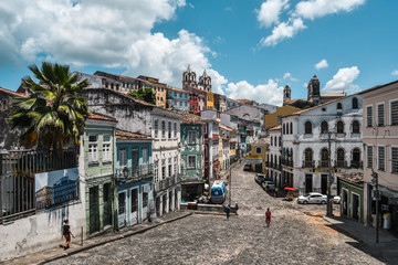 Salvador, Bahia / Brasil - 11/14/2019: Cityscape of old part of Salvador Bahia with colorful houses and beautiful clouds and blue sky
