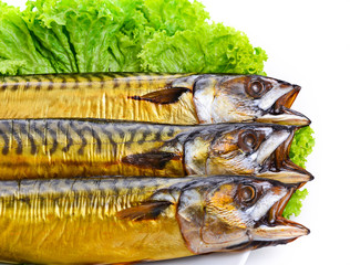 Smoked fish on plate close up mackerel