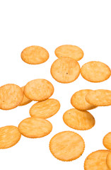 Top view of round crackers isolated on white background.