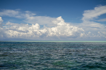 Three tones of sea under a beutiful sky. Dark blue and turquoise green in Semporna Islands, Borneo, Sabah.