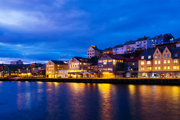 Fototapeta na wymiar View of city center of Kristiansund, Norway during the cloudy night
