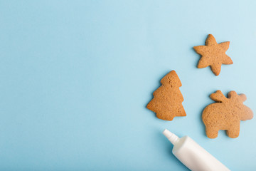 ginger biscuits and glaze on a blue background