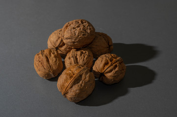walnuts on dark black grey background