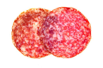 Salami sausage slices isolated on white background