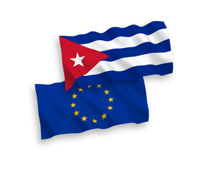 National vector fabric wave flags of European Union and Cuba isolated on white background. 1 to 2 proportion.