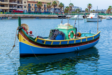 A traditional fishing boat luzzu on the sea