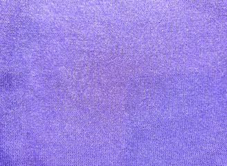 Purple cloth texture background. Material for clothes.