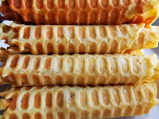 Waffle rolls. Delicious dessert holiday food. Homemade pastries. Fresh raw.