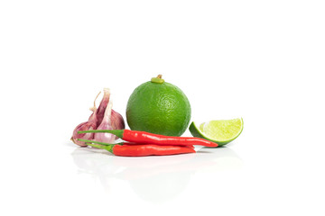 lime chilli  Piece lemon  Shallot with white background