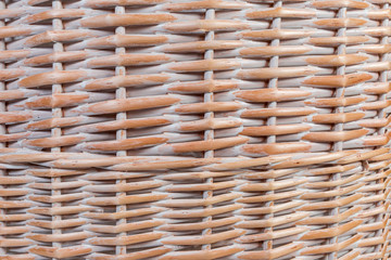 Background of wooden wicker laundry basket, fragment close-up