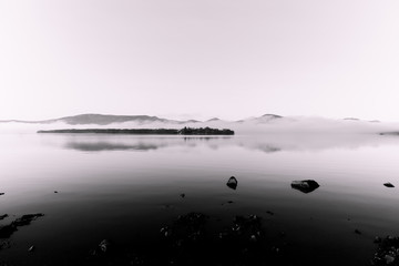 Mist over Loch Lomond in black and white