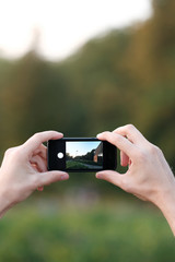 male hand holds the phone. mobile photography.