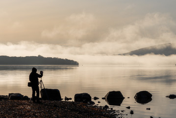 Photographer taking pictures of Loch Lomond