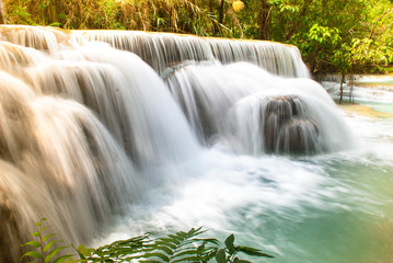 Beautiful waterfall in the green deep forest