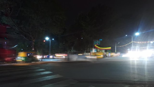 Cars Moving In A Busy Intersection During Evening Traffic In Bengaluru, India - Time Lapse