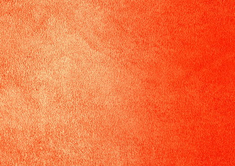 Fototapeta premium Suede leather. Genuine leather material. Orange background. Warm background. Skin testure. Suede.