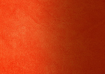 Fototapeta premium Suede leather. Genuine leather material. Orange background. Warm background. Skin testure. Suede.