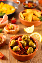 olive and spice, tapas- antipasto assortment on wood background