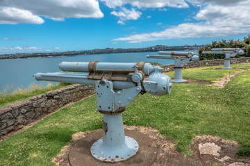 Old cannons on the coast of the sea. Devonport, Auckland, New Zealand.