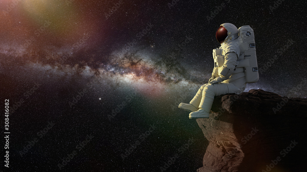 Sticker astronaut sitting on a cliff enjoying the view over an another world
