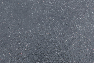 Black wet asphalt ice texture with small white dots