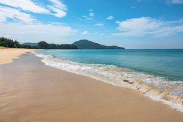 Fototapeta na wymiar White sand hot summer beach in Phuket Thailand