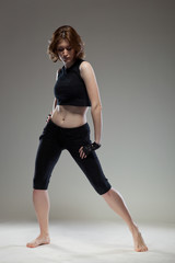 Naklejka premium attractive young woman dancing