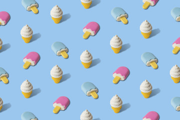 Creative art made of ice cream pattern on blue.