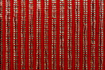 Abstract vertical red and golden lines background.