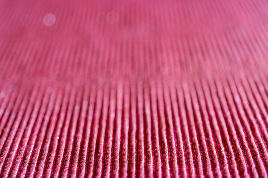 Abstract background of pink parallel lines.