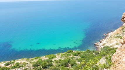 Fototapeta premium Scenic seascape. Black sea. Crimea. Cape Fiolent. Beautiful seaside on Black sea. Rocky cliffs and sea shore.