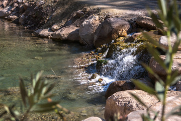 small waterfalls of a mountain river