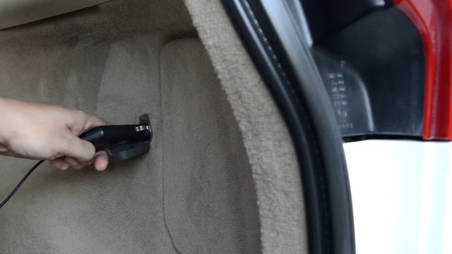 Plug in DC 12 volt socket in the car trunk