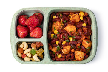 Lunch box with delicious food on a white background