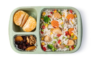 Lunch box with delicious food on a white background