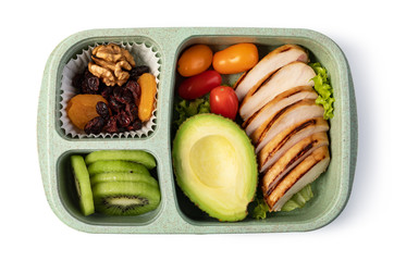 Lunch box with delicious food on a white background