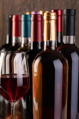 Row of vintage wine bottles