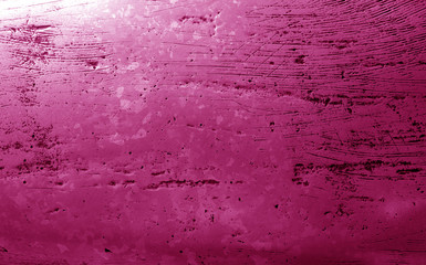 Metal rough surface in pink tone.