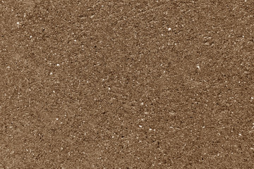 Weathered cement wall texture in brown color.