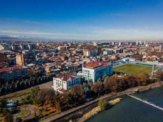 Vladikavkaz, capital of North Ossetia. Panorama of historical downtown from drone flight