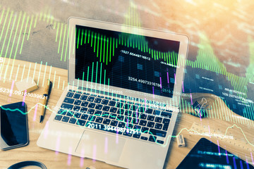 Multi exposure of chart and financial info and work space with computer background. Concept of international online trading.