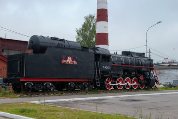 BOLOGOYE, RUSSIA - AUGUST 8, 2019: Monument to the Steam locomotive L-4245 installed on the...