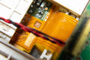 Macro photos showing tablet repair process. Tablet repair under the microscope. Mobile Board: Broken Tablet Board