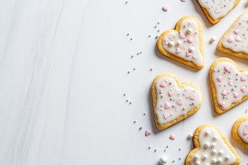 Cookies hearts with icing and decorated for Valentine's Day, white background, copy space....