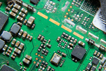 Macro photos showing tablet repair process. Tablet repair under the microscope. Mobile Board: Broken Tablet Board