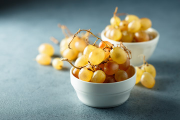 Ripe grape in white bowl